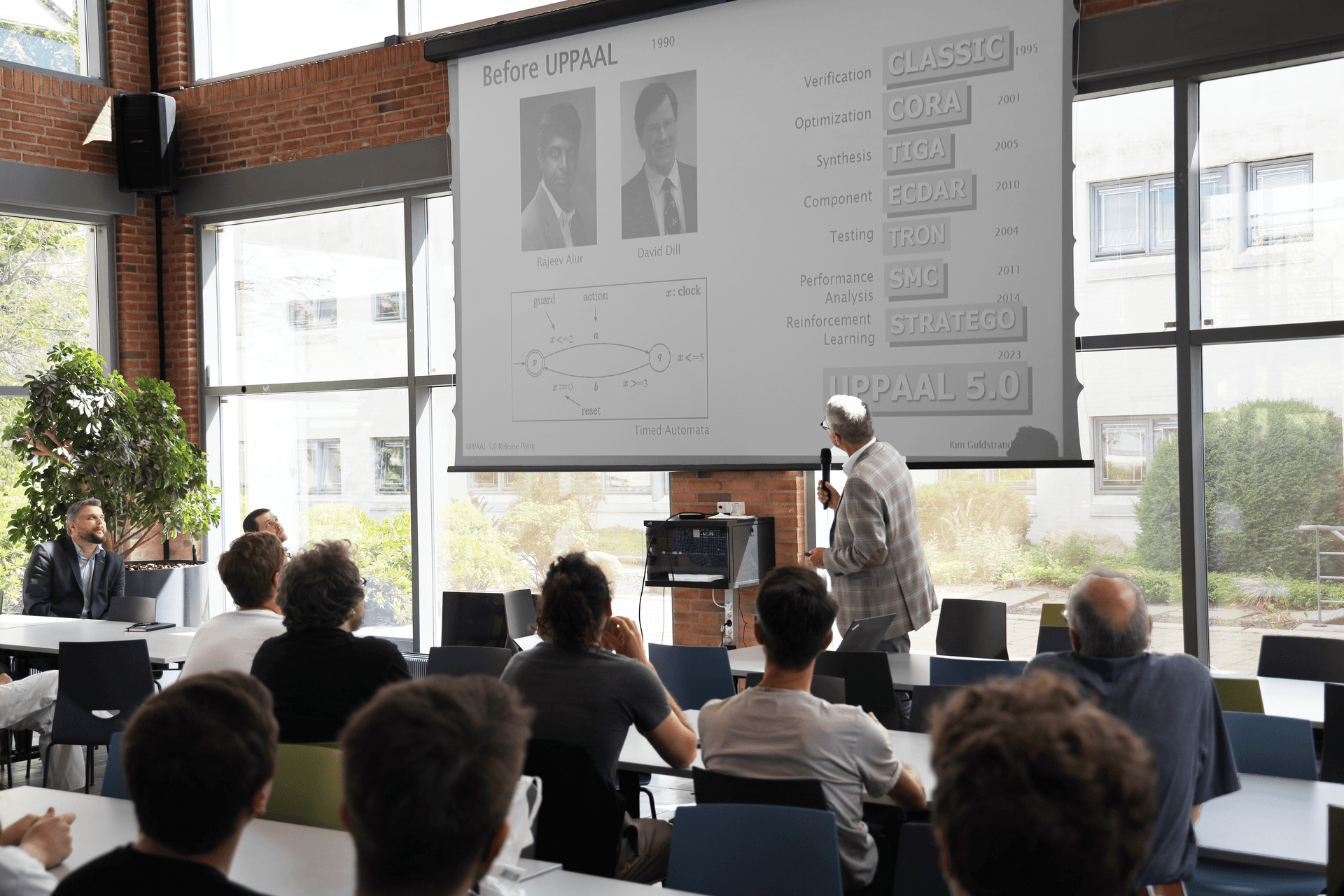 Kim Guldstrand Larsen covered the development of UPPAAL over time.