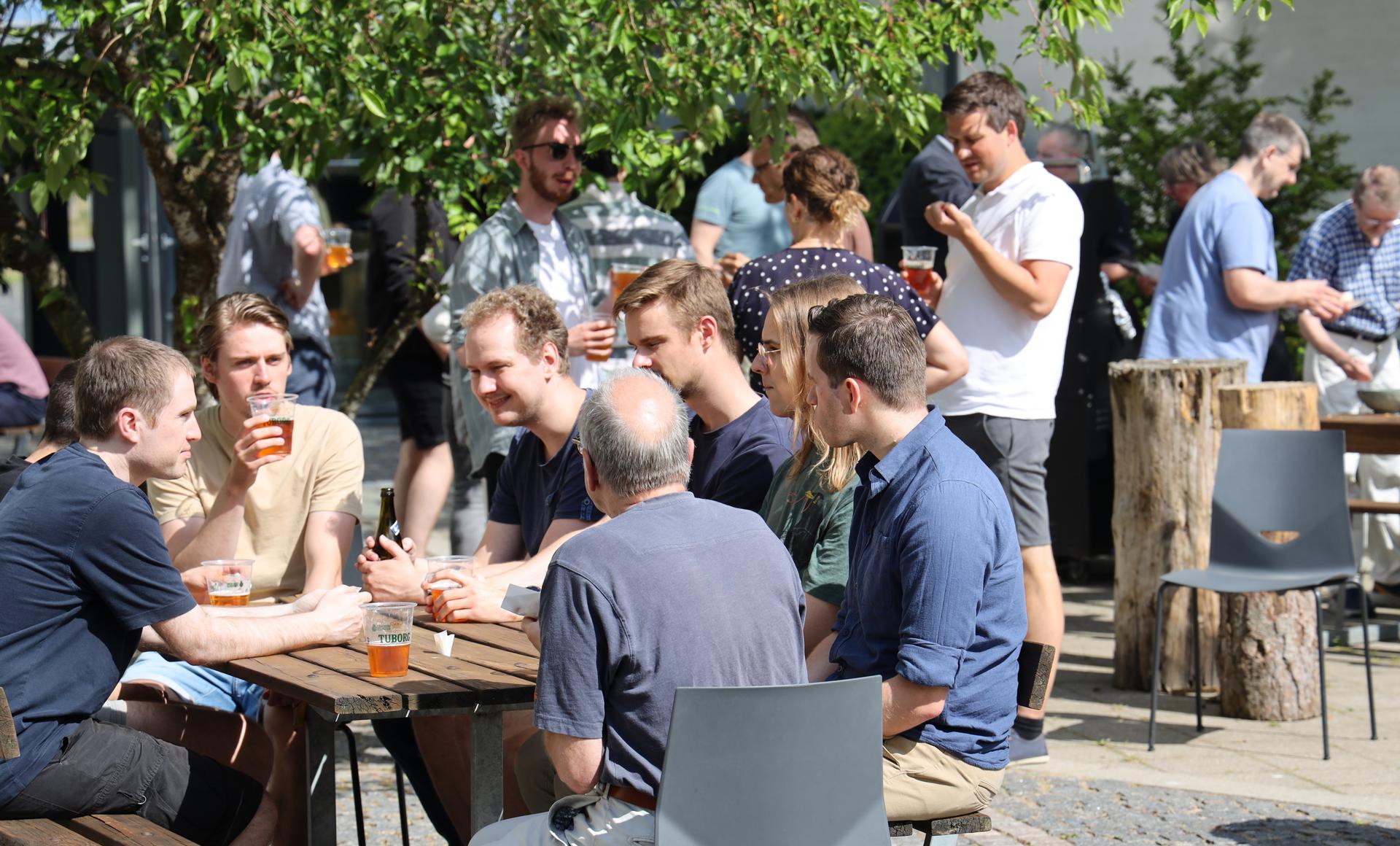 The reception was followed by hot dogs and cold beer in the department courtyard.