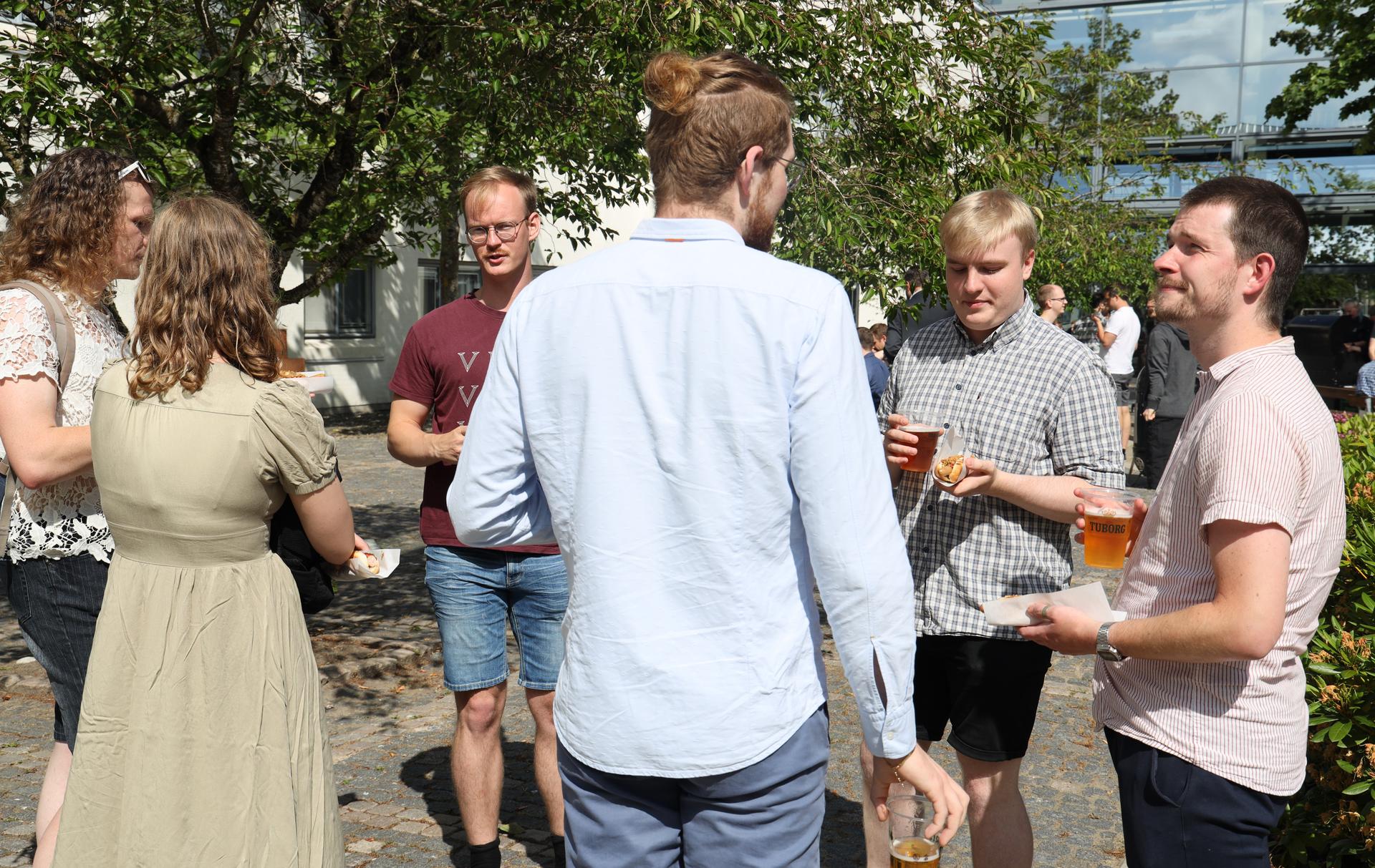 The reception was followed by hot dogs and cold beer in the department courtyard.