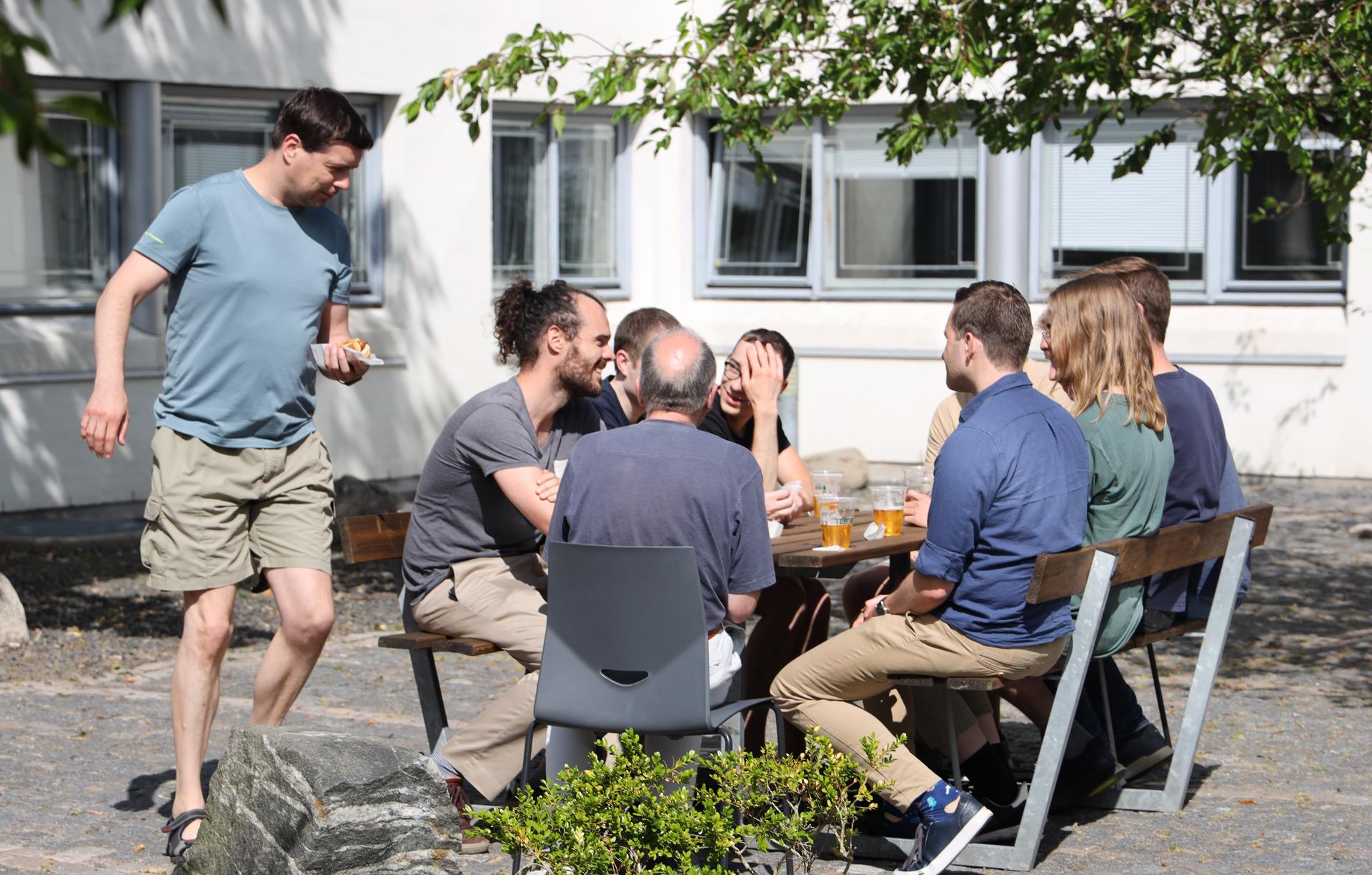 The reception was followed by hot dogs and cold beer in the department courtyard.